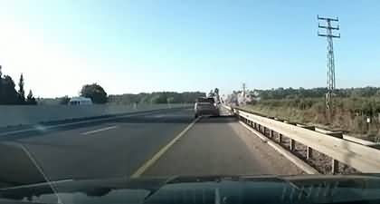 Dashcam footage caught a Hezbollah rocket falling on a highway in Israel