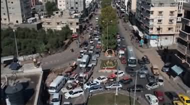 Drone footage shows convoys of Palestinians leaving northern Gaza