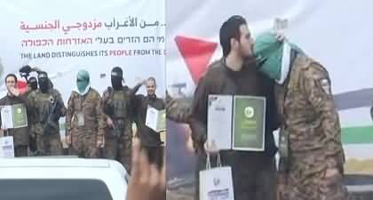 Exclusive Video: Freed Israeli hostage kisses forehead of Hamas members