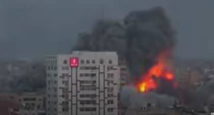 Exclusive Video: High-Rise Building in Gaza Crumbles After Israeli Airstrike