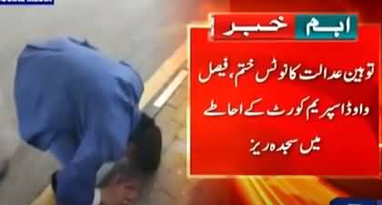 Faisal Vawda bows down in front of supreme court's building after getting pardon in contempt of court