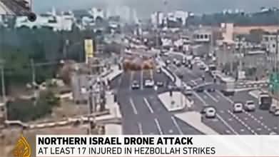 Hezbollah drone 'swarm' hits military, civilian areas deep in Israel