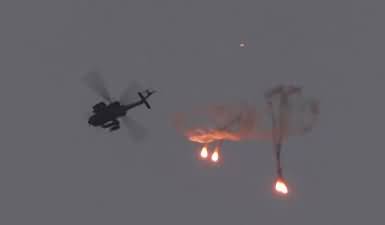 Israeli army helicopter fires machine guns over Gaza