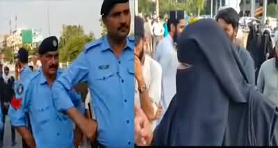 Lal Masjid's burqa clad woman threatens Islamabad police with suicide attacks