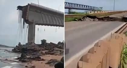 Moment A bridge in Brazil collapses killing two and sending lorry into the river