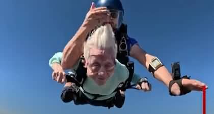 Moment When A 104-year-old woman skydives out of plane in world record attempt