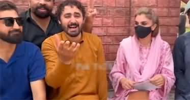 PTI supporters singing Imran Khan's songs sitting with Khadija Shah