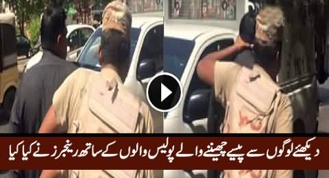 Rangers Arrest Two Policemen For Snatching Money From People, Watch Public Reaction