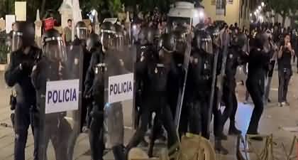 Thousands protest and clash with police in Spain's Valencia over poor flood disaster response