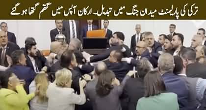 Turkish parliament descends into chaos as dozens of MPs take part in fistfight