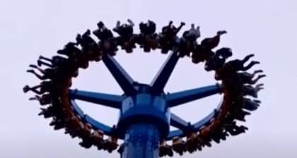 US: Nearly 30 people left suspended upside down as swing ride suddenly stopped in mid-air