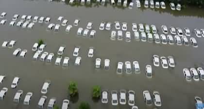 Video shows overflowing river swamps cars in India