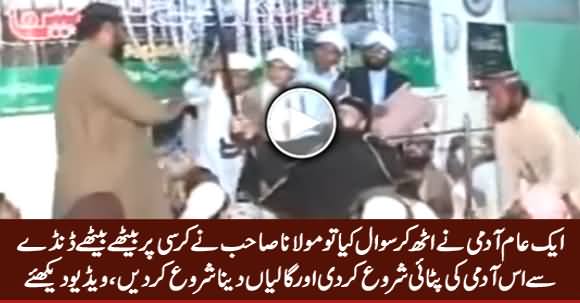 Watch How Maulana Sahib Beating & Abusing A Man For Asking A Question